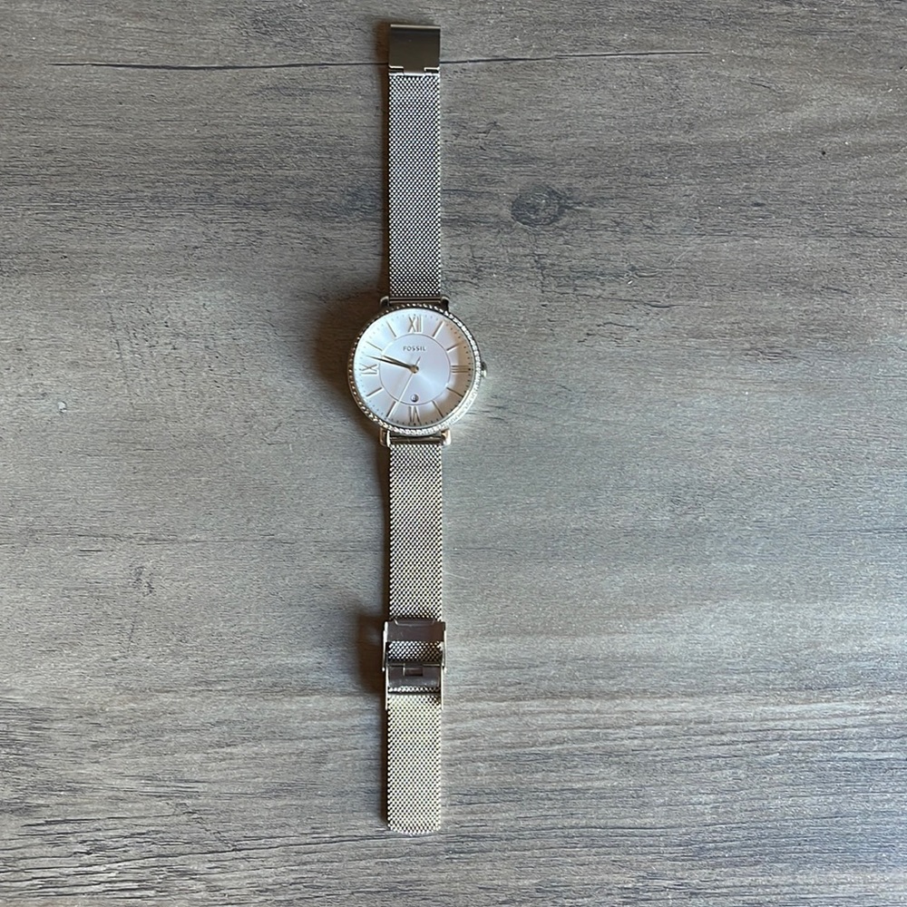 Women’s Fossil watch, silver with diamond accents around face